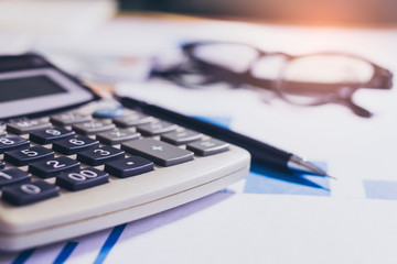 account work calculator, profit and tables on desk