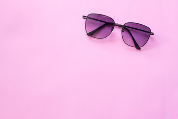 Black glasses , Minimal style layout Leave blank for the text. On a pastel pink background