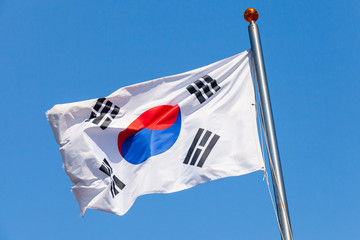 South Korea flag over blue sky