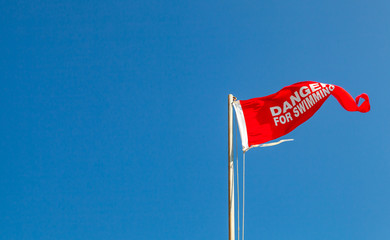 Danger for swimming. Red warning flag