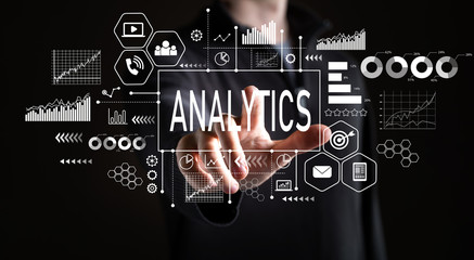 Analytics with businessman on a black background 