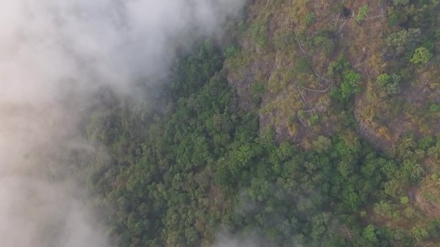 Drone shot: Mt Zwegabin during sunrise partly covered in clouds