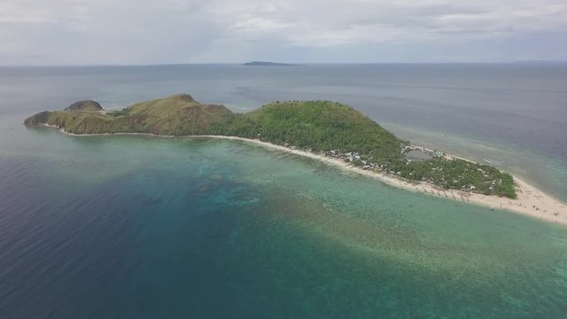 Drone shot of tropical Mararison island during cloudy day. Philippines