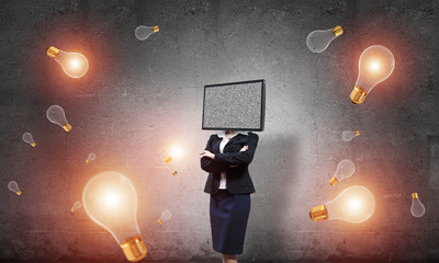 Business woman with TV instead of head.