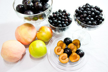 Healthy fruits : Cherry Plums,  Aronia(chokeberries), peach and plum.
