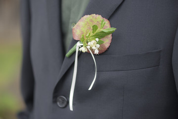 Details suit of groom at wedding
