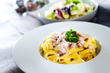 tasty Carbonara pasta on the table