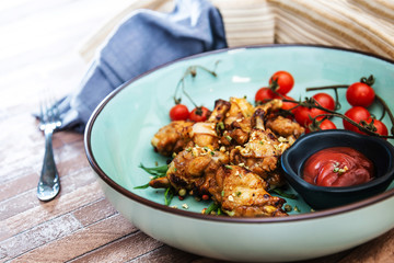roasted sleeves chicken with potatoes and barbecue sauce