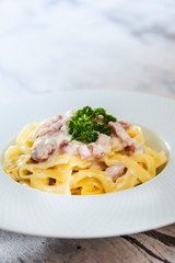 tasty Carbonara pasta on the table