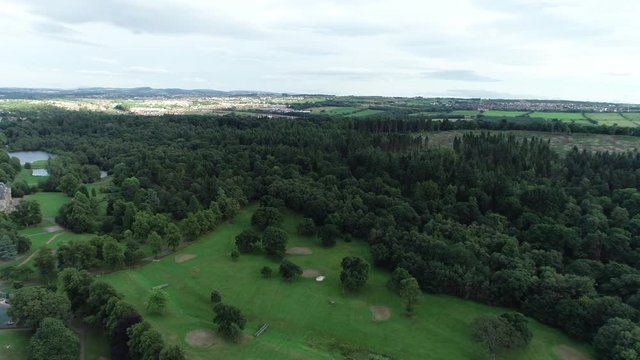 Aerial footage over Callendar Park in Falkirk, Scotland.
