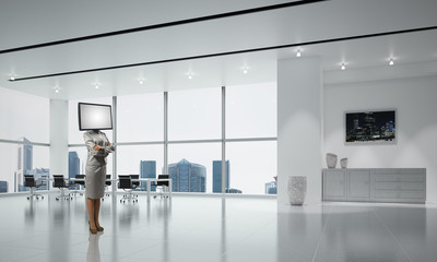 Business woman with TV instead of head.