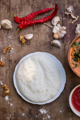 Gomi (mamaliga porridge) - popular dish from Samegrelo region made of white coarse cornmeal, butter and salt. Georgian traditional food.