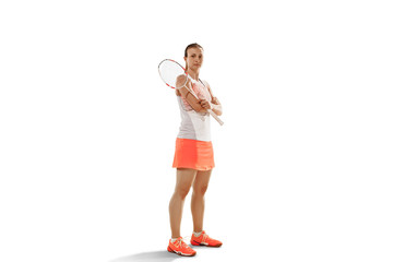 Young woman badminton player over white studio background. Fit female athlete isolated on white.