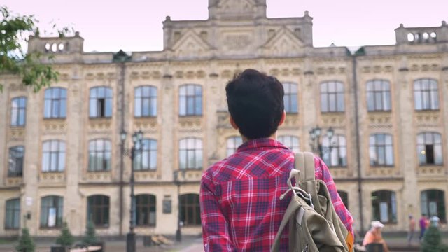 Back View Of Young Female Student With Short Black Hair Walking To University, Woman Going To College Daytime