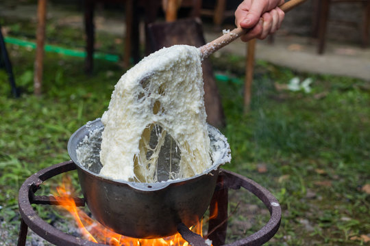 Elarji - from Samegrelo region, made from coarse cornmeal, cornflour and Suluguni cheese. Gomi cooked with cheese. Georgian traditional food - elardji. 
