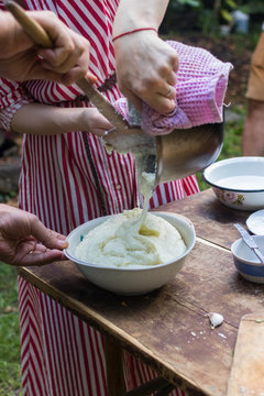 Elarji - from Samegrelo region, made from coarse cornmeal, cornflour and Suluguni cheese. Gomi cooked with cheese. Georgian traditional food - elardji. 