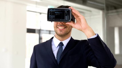 business, technology and augmented reality concept - businessman with vr headset and virtual screen at office - Powered by Adobe