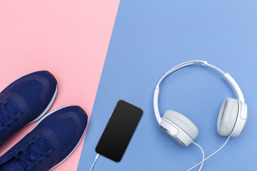 Sneakers and mobile phone with headphones