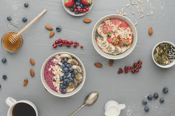 Helthy breakfast. Delicious smoothie bowls with fruits, berries and seeds.