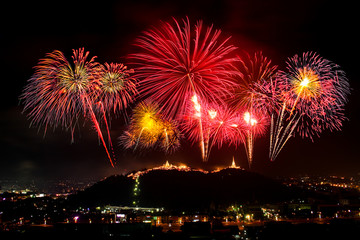 Fireworks show at dark night at Phra Nakorn Kiri (Khao Wang) in Petchaburi, Thailand