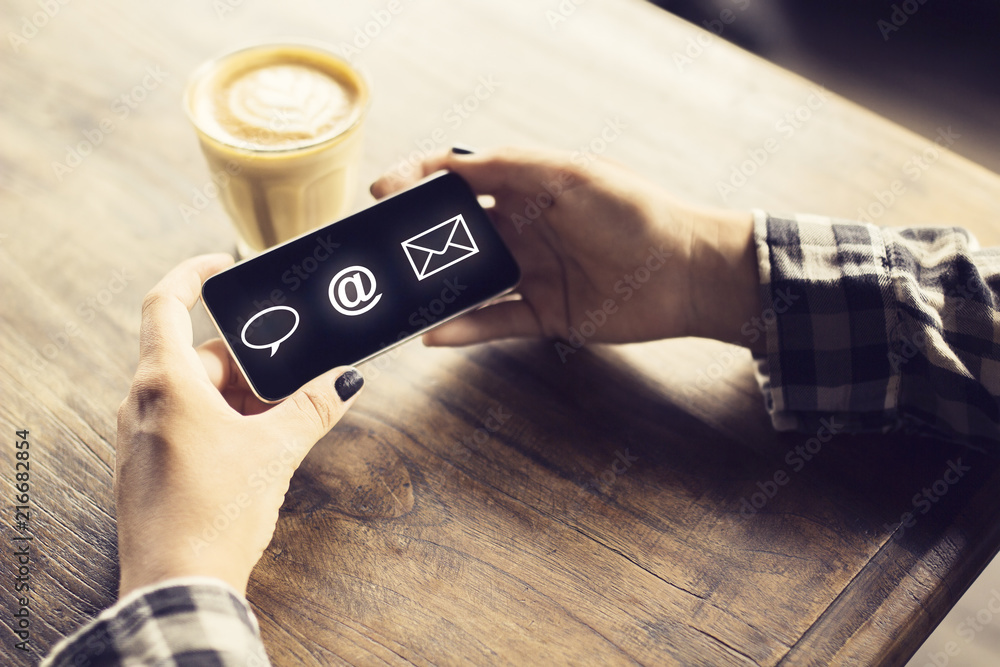 Poster hands using cellular phone
