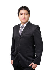 Isolated young asian business man in formal suit with necktie on white background