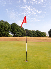 Obraz premium Golf green flag, Chorleywood Common