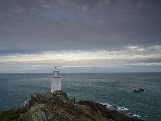 Fototapeta premium Summer sunset on Start Point Light in Devon, UK