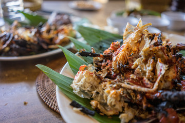 seafood plate in bali indonesia served on banana leaf