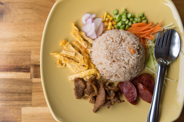 Rice Seasoned with Shrimp Paste Recipe on wooden table