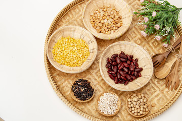healthy food concept : Colorful organic beans group in wicker ware bamboo tray 