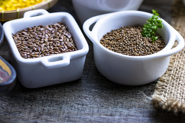 healthy food concept : flex seed and perilla seed in cute tiny cup for vegan lover concept