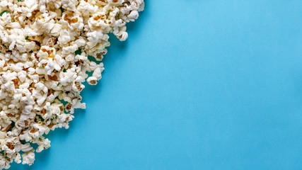 popcorn on a colored background top view

