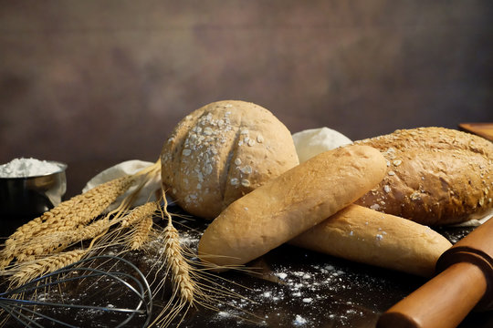 homemade bread on the kitchen table with dark background