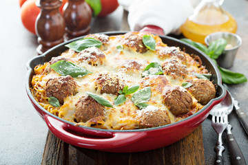 Baked meatballs with spaghetti and cheese