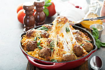 Baked meatballs with spaghetti and cheese