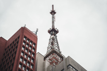 Fototapeta na wymiar Antenna of a Modern Business Skyscraper Building at Financial Center of Paulista Avenue, Sao Paulo SP