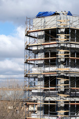 New building construction site with scaffolding
