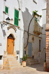 Italy, Puglia region, Locorotondo,  a whitewashed village in the Itria valley, with its medieval historical center full of stairs, balconies, flowers, arches, frescoed churches, and details