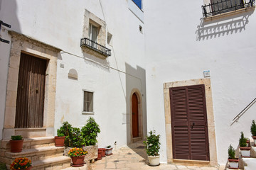 Italy, Puglia region, Locorotondo,  a whitewashed village in the Itria valley, with its medieval historical center full of stairs, balconies, flowers, arches, frescoed churches, and details