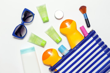 Summer cosmetic bag essentials