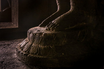 Legs of Buddha Statue in Ellora caves near Aurangabad, Maharashtra state in India