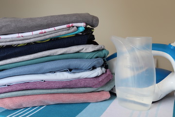 laundry items,ironed ,clran and tidy bedding and clothing.hot iron