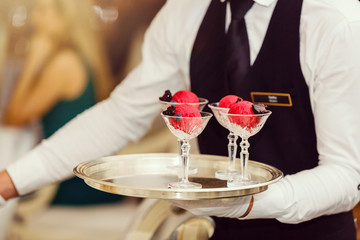 Sorbet Cream, Waiter is carrying desserts on a tray for summer