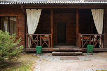 Fototapeta na wymiar Entrance to a beautiful wooden house