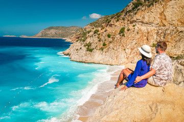 happy young couple man and woman on vacation at Kaputas beach Kas Turkey