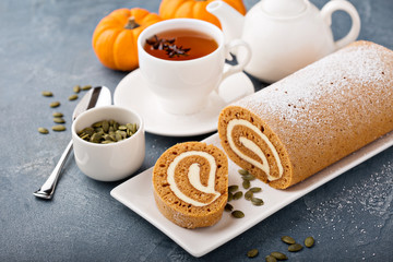 Fall dessert pumpkin roll with cream cheese