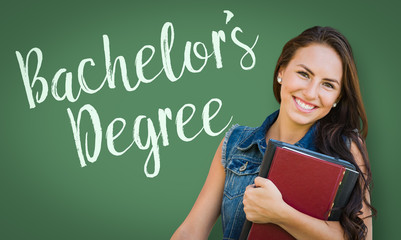 Bachelors Degree Written On Chalk Board Behind Mixed Race Young Girl Student Holding Books