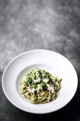 organic italian ricotta and fresh mixed herbs tagliatelle plate