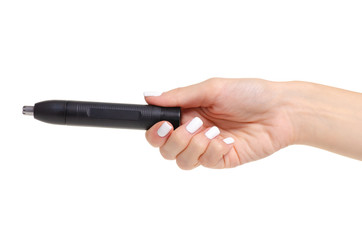 Hair clipper in the nose in hand on a white background isolation